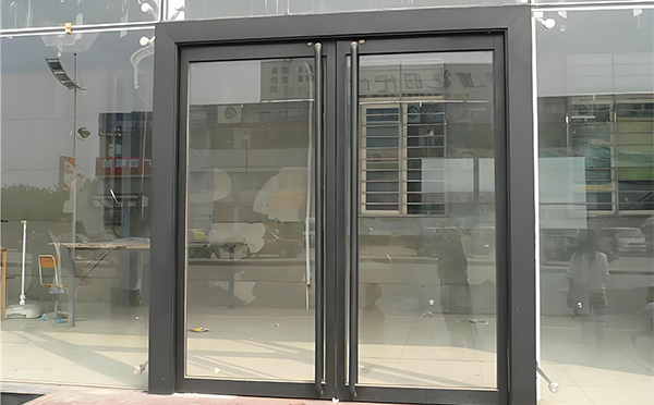 金台玻璃地弹门