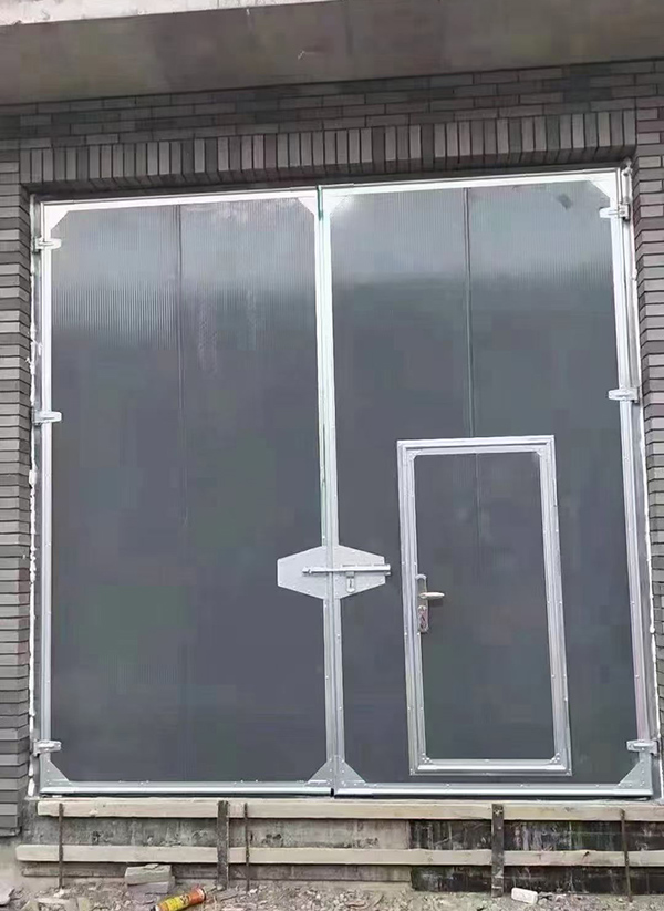 金台工业平开门在大型设备制造车间的应用实例